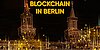 Oberbaumbrücke in Berlin mit dem Schriftzug "Blockchain in Berlin" darüber