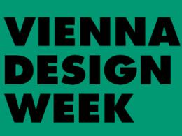 Vienna Design Week Logo: VIENNA DESIGN WEEK in schwarzen Blockbuchstaben vor grünem Hintergrund.